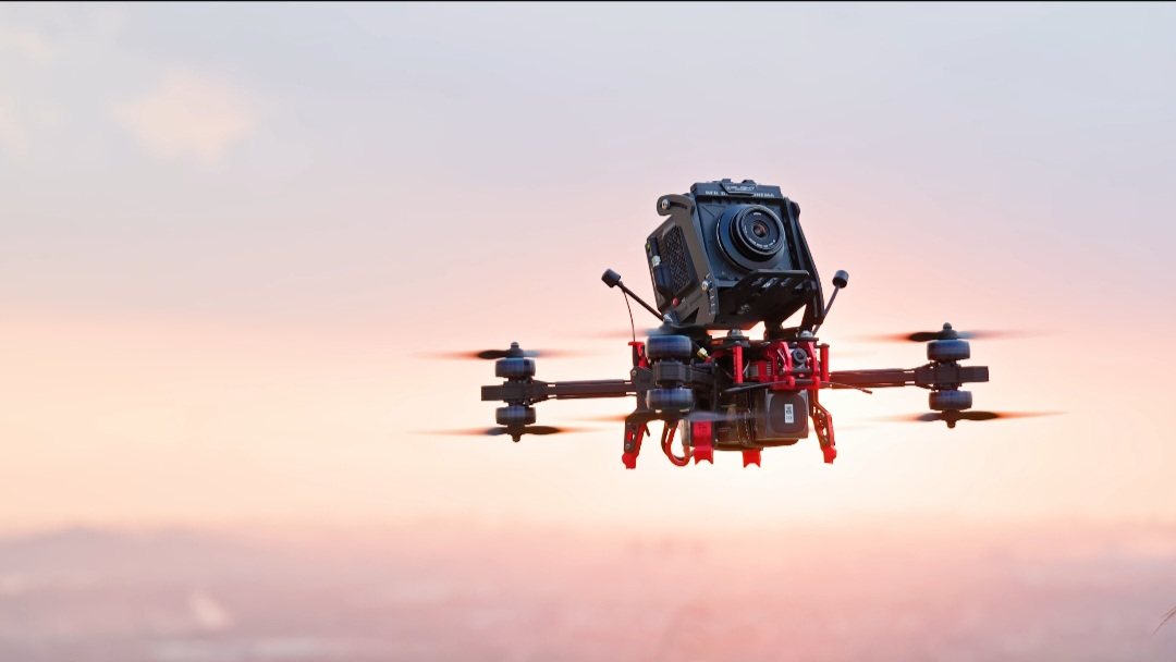 RED KOMODO cinema camera mounted on a cinelifter FPV drone for professional aerial cinematography — source: iFlight Europe